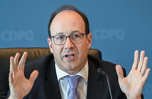 The Caisse de dépôt et placement du Québec has increased its stake in dairy company Saputo Inc. Caisse president and CEO Charles Emond speaks during a press conference regarding results in Montreal, Wednesday, August 14, 2024. THE CANADIAN PRESS/Graham Hughes