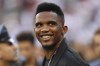 FILE - Soccer player Samuel Eto'o watches warmups before an International Champions Cup soccer match between Atletico Madrid and Real Madrid on July 26, 2019, in East Rutherford, N.J. (AP Photo/Steve Luciano, File)
