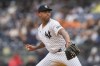 New York Yankees' Luis Gil pitches during the first inning of a baseball game against the Pittsburgh Pirates, Saturday, Sept. 28, 2024, in New York. (AP Photo/Frank Franklin II)