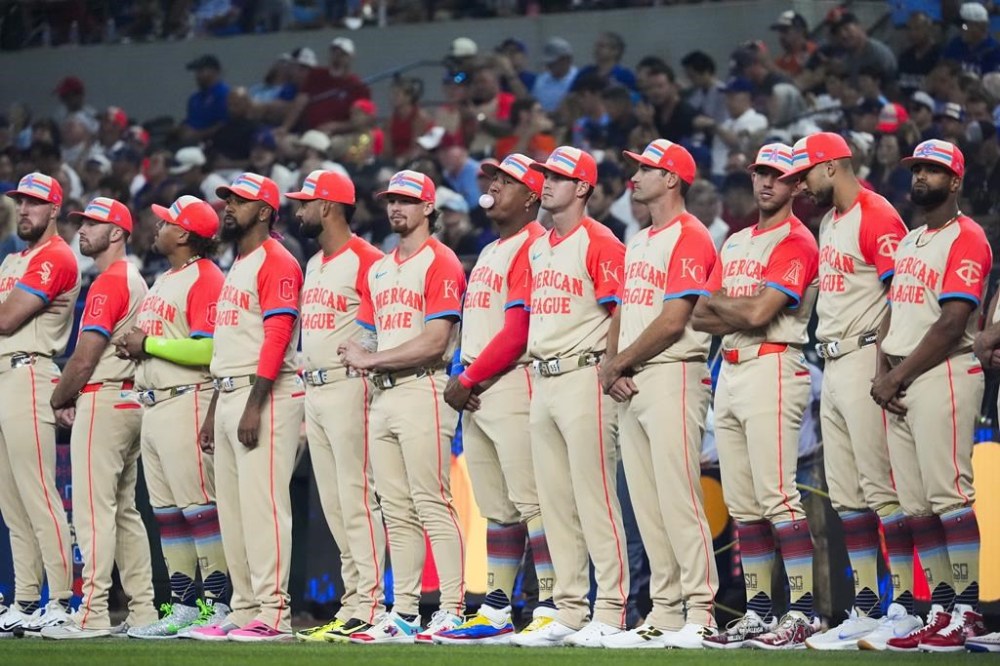FILE - American League players line up before the MLB All-Star baseball game, July 16, 2024, in Arlington, Texas. (AP Photo/LM Otero, File)