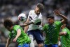 Vancouver Whitecaps' Tristan Blackmon, centre, vies for the ball against Seattle Sounders' Cody Baker, left, and Xavier Arreaga during second half MLS soccer in Vancouver, B.C., Saturday, May 20, 2023. THE CANADIAN PRESS/Darryl Dyck