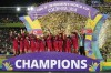 North Korean players celebrate with the trophy after winning the U-20 Women's World Cup final soccer match against Japan at El Campin stadium in Bogota, Colombia, Sunday, Sept. 22, 2024.(AP Photo/Fernando Vergara)