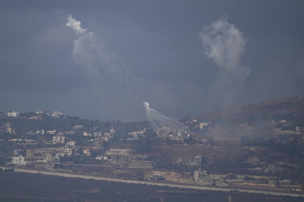 Israeli shelling hits an area in southern Lebanon as seen from northern Israel, Tuesday, Oct. 1, 2024. (AP Photo/Leo Correa)