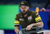 Manitoba-Carruthers third Reid Carruthers calls out to the sweepers after delivering a rock while playing Team Canada during the playoffs at the Brier, in Regina, Friday, March 8, 2024. THE CANADIAN PRESS/Darryl Dyck