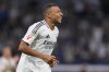 Real Madrid's Kylian Mbappe celebrates after he scored his team's fourth goal against Espanyol during a Spanish La Liga soccer match at Santiago Bernabeu stadium in Madrid, Spain, Saturday, Sept. 21, 2024. (AP Photo/Manu Fernandez)
