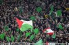 Celtic fans wave the flags of Palestine and Lebanon ahead of the Champions League opening phase soccer match between Borussia Dortmund and Celtic FC at the BVB Stadion in Dortmund, Tuesday, Oct. 1, 2024. (AP Photo/Martin Meissner)
