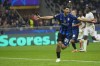 Inter Milan's Mehdi Taremi celebrates after scoring his side's fourth goal from penalty spot during the Champions League opening phase soccer match between Inter Milan and Red Star, at the San Siro stadium in Milan, Italy, Tuesday, Oct. 1, 2024. (AP Photo/Luca Bruno)