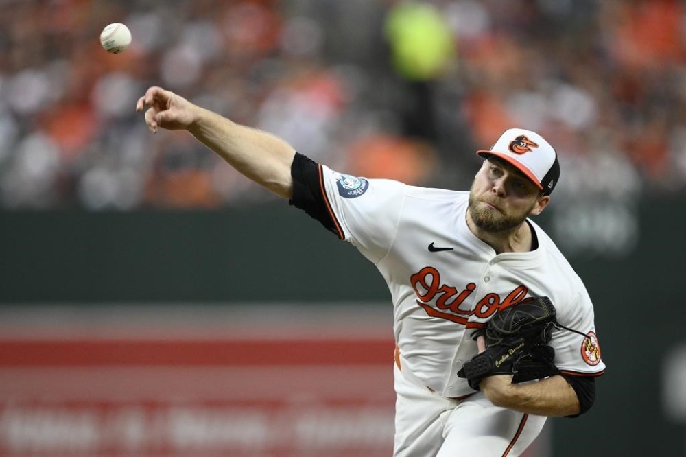 Baltimore Orioles starting pitcher Corbin Burnes throws in the third inning during Game 1 of an AL Wild Card Series baseball game against the Kansas City Royals, Tuesday, Oct. 1, 2024, in Baltimore. (AP Photo/Nick Wass)