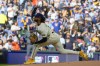 Milwaukee Brewers pitcher Freddy Peralta throws during the first inning of Game 1 of a National League wild card baseball game against the New York Mets Tuesday, Oct. 1, 2024, in Milwaukee. (AP Photo/Morry Gash)