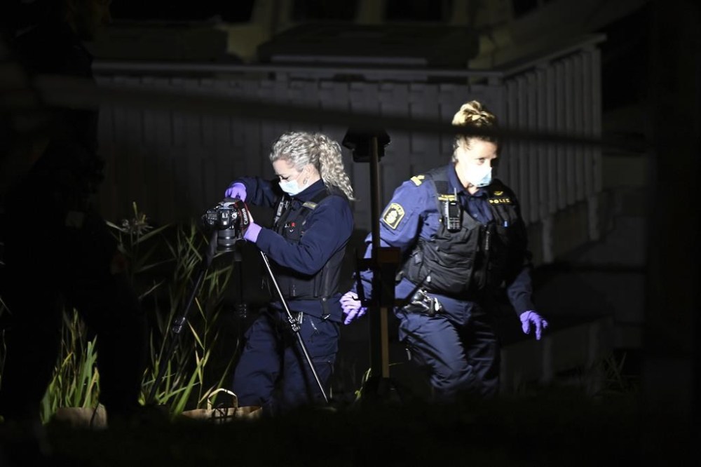Police work outside the Israeli embassy in Stockholm, Sweden, Tuesday, Oct. 1, 2024, after a suspected shooting near the embassy. (Anders Wiklund/TT News Agency via AP)
