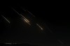 Missiles launched from Iran towards Israel are seen in the West Bank city of Nablus Tuesday, Oct. 1, 2024. (AP Photo/Majdi Mohammed)