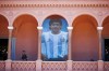 FILE - A giant poster of Diego Maradona is displayed on a balcony of the presidential palace in Buenos Aires, Argentina, Nov. 26, 2020. (AP Photo/Marcos Brindicci, File)