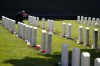 FILE - A member of the media photographs headstones at the cemetery of the U.S. Army's Carlisle Barracks, June 10, 2022, in Carlisle, Pa. (AP Photo/Matt Slocum, File)