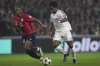 Real Madrid's Endrick, right, and Lille's Bafode Diakite compete for the ball during the Champions League opening phase soccer match between Lille and Real Madrid at the Stade Pierre Mauroy in Villeneuve-d'Ascq, outside Lille, France, Wednesday, Oct. 2, 2024. (AP Photo/Thibault Camus)