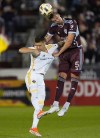 Colorado Rapids defender Andreas Maxsø, right, heads the ball while Los Angeles Galaxy forward Gabriel Pec defends in the first half of an MLS soccer match, Wednesday, Oct. 2, 2024, in Commerce City, Colo. (AP Photo/David Zalubowski)