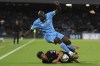 Napoli's Romelu Lukaku, top, in action during the Italian Serie A soccer match between Napoli and Monza at the Diego Armando Maradona Stadium in Naples, Italy, Sunday, Sept. 29, 2024. (Alessandro Garofalo/LaPresse via AP)