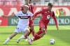 AC Monza's Daniel Maldini, right, and Bologna's Jens Odgaard, left, challenge for the ball during a Serie A soccer match between Monza and Bologna in Monza, Italy, Sunday, Sept. 22, 2024. (Studio Buzzi/LaPresse via AP)