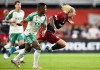 Toronto FC forward Federico Bernardeschi (right) falls while defended by Austin FC midfielder Jhojan Valencia (5) during second half MLS soccer action in Toronto, on Saturday, September 14, 2024. THE CANADIAN PRESS/Chris Katsarov