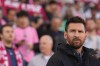 Inter Miami forward Lionel Messi (10) looks on from the sidelines before the start of MLS soccer action against Toronto FC in Toronto on Saturday, Oct. 5, 2024. THE CANADIAN PRESS/Chris Young