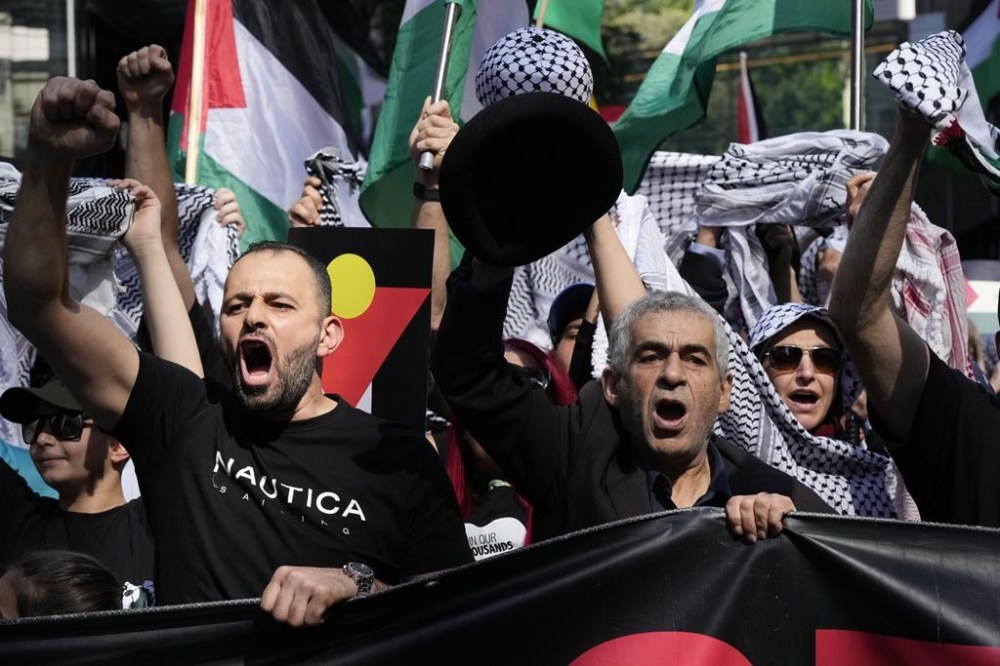 Pro-Palestinian supporters rally in Sydney, Sunday, Oct. 6, 2024. (AP Photo/Rick Rycroft)