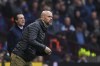 Manchester United's head coach Erik ten Hag, front, and Aston Villa's head coach Unai Emery react during the English Premier League soccer match between Aston Villa and Manchester United, at Villa Park in Birmingham, England, Sunday, Oct. 6, 2024. (AP Photo/Rui Vieira)