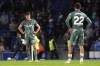 Tottenham Hotspur's Micky van de Ven, left, and Brennan Johnson look dejected after defeat in the Premier League match at the American Express Stadium, Brighton, England, Sunday Oct. 6, 2024. (Gareth Fuller/PA via AP)