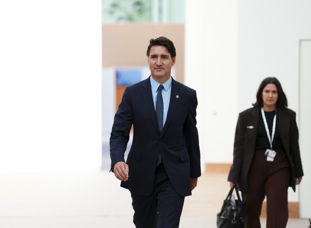Justin Trudeau will travel to Laos later this week for the ASEAN summit, marking what his office says will be the first official visit of a Canadian prime minister to the Southeast Asian country. Trudeau makes his way to a meeting meeting at the Francophonie Summit in Paris, France on Saturday, Oct. 5, 2024. THE CANADIAN PRESS/Sean Kilpatrick