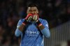 Girona's goalkeeper Paulo Gazzaniga reacts during the Champions League soccer match between Girona and Feyenoord, in Girona, Spain, Wednesday, Oct. 2, 2024. (AP Photo/Joan Monfort)