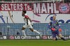 Frankfurt's Omar Marmoush, centre, celebrates after scoring his side's first goal past Bayern's goalkeeper Manuel Neuer during the German Bundesliga soccer match between Eintracht Frankfurt and Bayern Munich in Frankfurt, Germany, Sunday, Oct. 6, 2024. (AP Photo/Michael Probst)