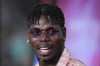 French professional soccer player Paul Pogba stands in a VIP suite at the start of an MLS soccer match between Inter Miami and Charlotte FC, Saturday, Sept. 28, 2024, in Fort Lauderdale, Fla. (AP Photo/Rebecca Blackwell)