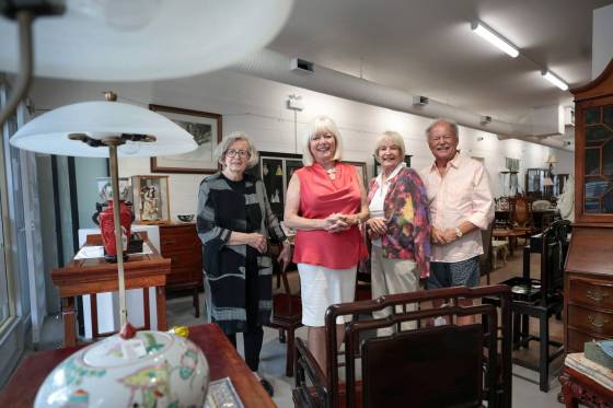 Volunteers Elizabeth Morrison (from left), Evelyn Mitchell, Jane Fudge and Al Friesen inside the Things Supporting the RWB shop on Corydon Avenue. (Ruth Bonneville / Free Press)