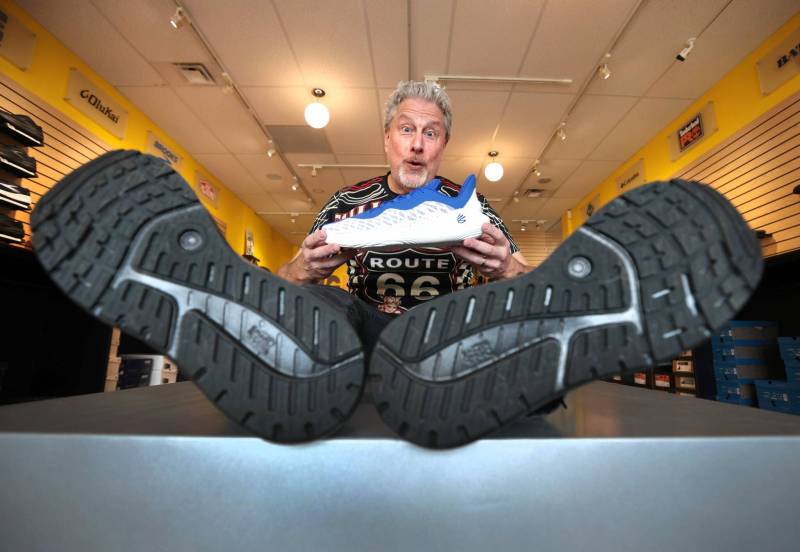 RUTH BONNEVILLE / FREE PRESS
After 15 years of selling size 13-18 footwear for men, Gregg Druxman is closing his niche, one-man operation near St. Vital Centre at the end of the year: ‘I get my pension. I’ve got my Lily Leash (invention) … This is another chapter.’