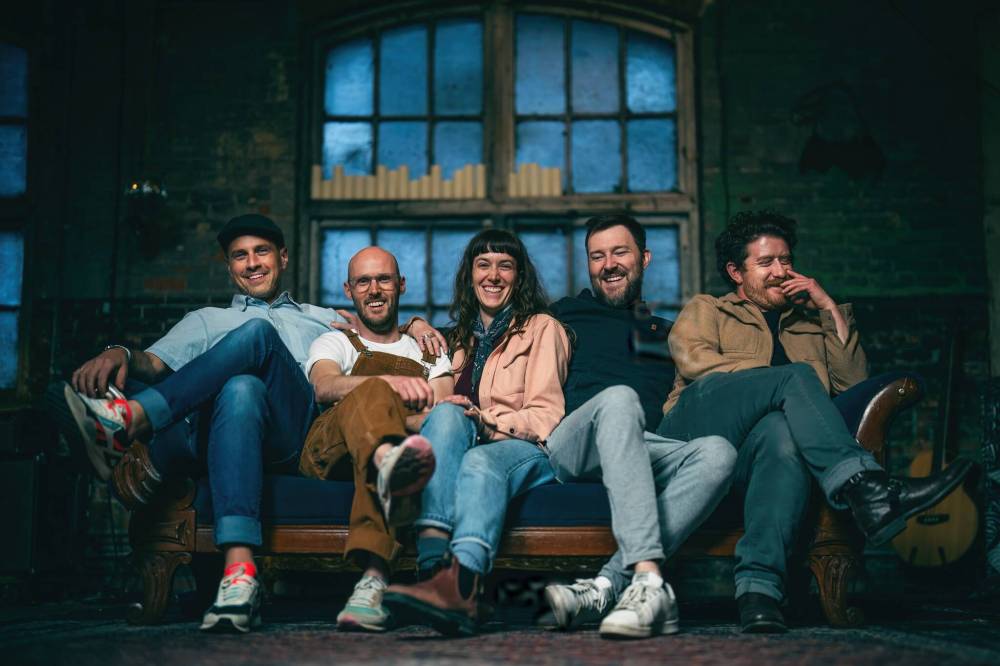 Roger (centre) is a collaborator with The Fretless. (From left) Karrnnel Sawitsky, Trent Freeman, Eric Wright and Ben Plotnick.
                                ANDREW COLLINS PHOTO