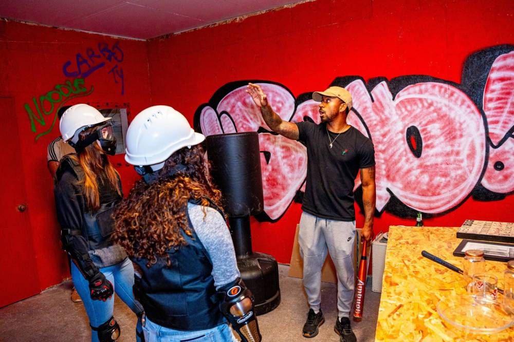 NIC ADAM / FREE PRESS
Unleashed Rage Rooms owner Tyree Gordon poses for a photo in the Jason room of his new business.
