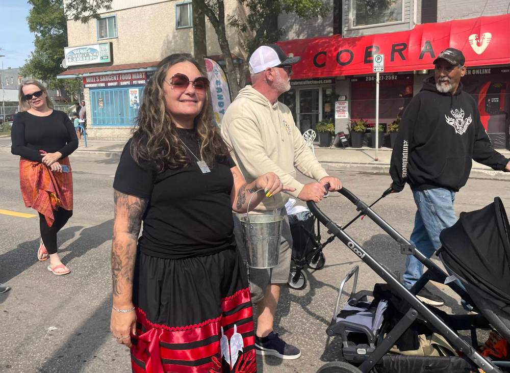 Maggie Macintosh / Free Press
Tahl East donned black and red on Saturday to pay tribute to the late Cathy Merrick and her tireless advocacy for missing and murdered Indigenous women and girls.