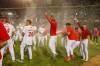 DAVE MAHUSSIER PHOTO
                                Winnipeg Goldeyes celebrate victory over Sioux Falls Canaries in Game 3 of Playoff Series.