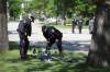 RUTH BONNEVILLE / FREE PRESS FILES
                                Police investigate after cyclist Rob Jenner was hit on Wellington Crescent on June 6. He later died.