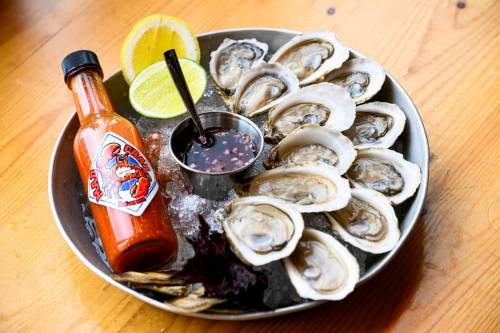 Mike Sudoma / Free Press
                                Freshly shucked oysters pair perfectly with Aaron Crawford&rsquo;s homemade hot sauce.
