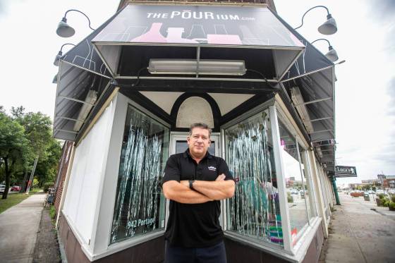 Scott Holden, co-owner of The Pourium, said thieves acted like they were shopping, picking and choosing bottles to steal. (Mikaela MacKenzie / Free Press)