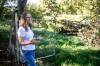 MIKAELA MACKENZIE / FREE PRESS
                                Cat Macaulay Gauthier points out piles of trees that were recently taken down by the developer at Lemay Forest.