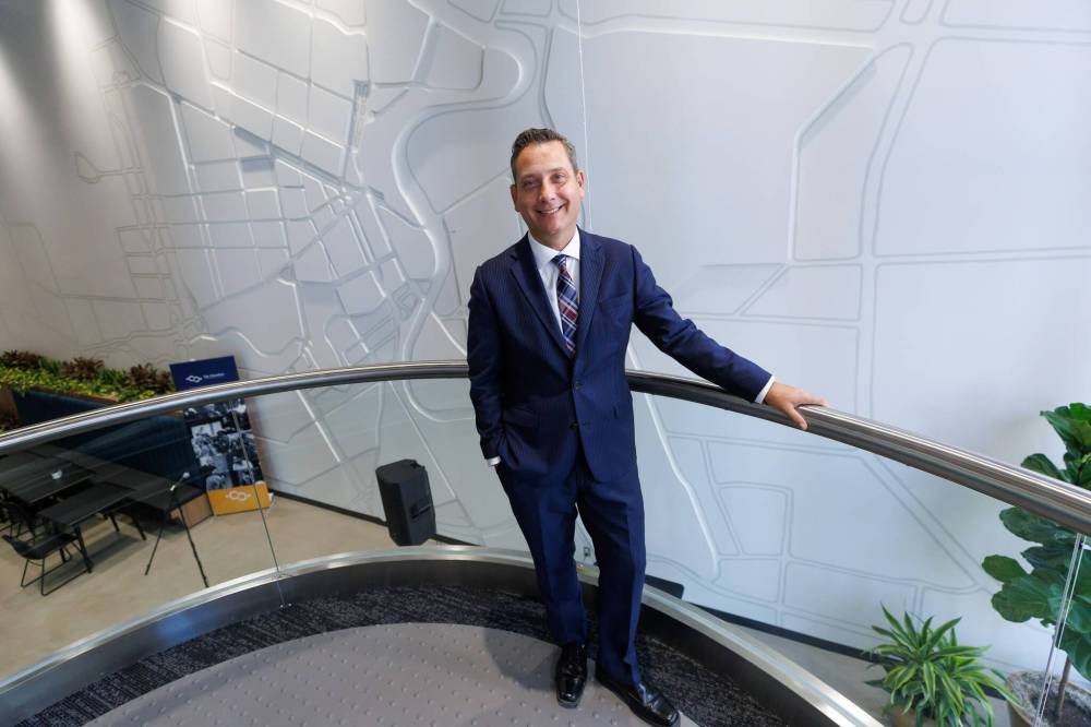MIKE DEAL / FREE PRESS
Winnipeg Chamber of Commerce CEO, Loren Remillard, in the lobby of the new space at Portage Avenue and Main Street.