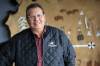 Sioux Valley Dakota Nation Chief Vince Tacan, seen here standing in a board room at the community band office on Sept. 16, says Manitoba Premier Wab Kinew has offered Dakota First Nations a share of provincial gaming revenue if they commit to ending any pursuit of building a casino in Manitoba. (Matt Goerzen/The Brandon Sun)