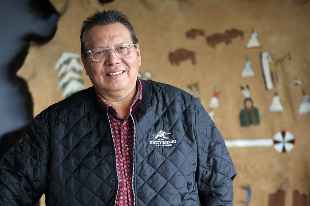 Sioux Valley Dakota Nation Chief Vince Tacan, seen here standing in a board room at the community band office on Sept. 16, says Manitoba Premier Wab Kinew has offered Dakota First Nations a share of provincial gaming revenue if they commit to ending any pursuit of building a casino in Manitoba. (Matt Goerzen/The Brandon Sun)