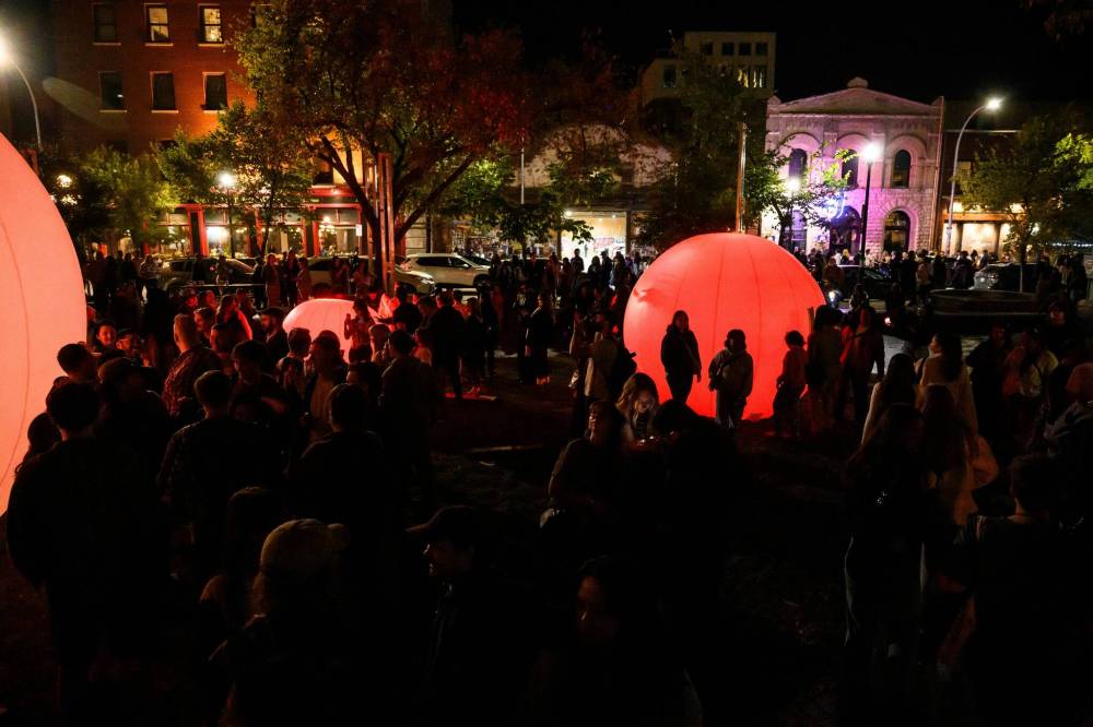 MIKE SUDOMA / FREE PRESS
moonGARDEN by artist Anna Pinto Diallo takes over the Cube in the Exchange District with its giant coloured balls and soundscapes.