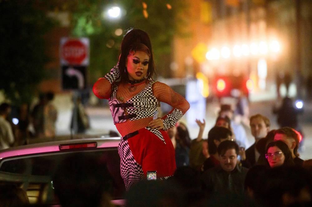 MIKE SUDOMA / FREE PRESS
Drag performer Ruby Chopstix performs during Nuit Blanche in the Exchange District Saturday.