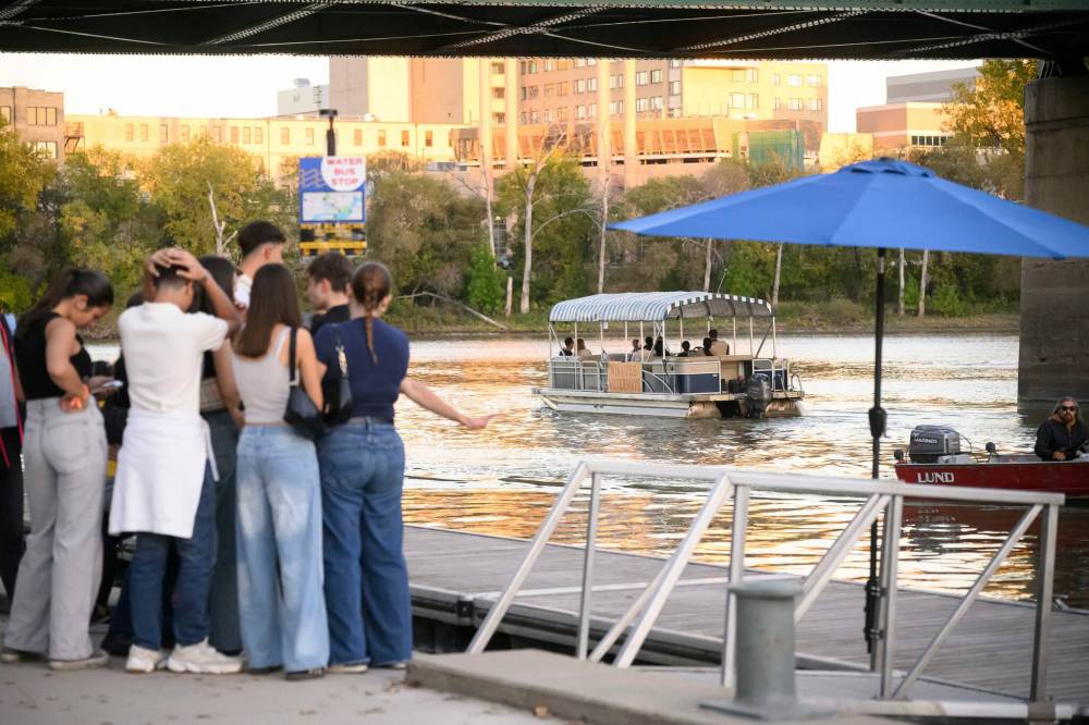 MIKE SUDOMA / FREE PRESS
The water taxis were in high demand Saturday night as Nuit Blanche festivalgoers enjoyed free rides to multiple locations from downtown to The Forks.