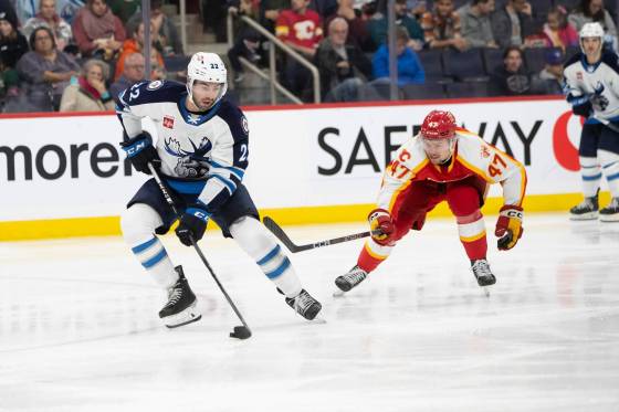 Former Jets defenceman Kyle Capobianco (left) is back in town tonight with the Dallas Stars. (Brook Jones / Free Press files)