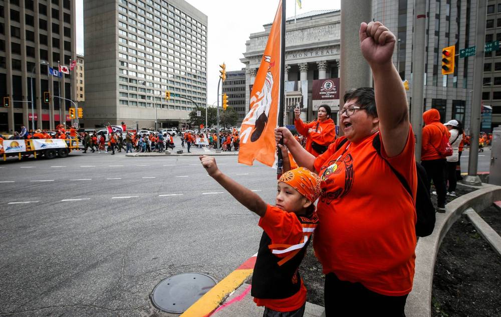 JOHN WOODS / FREE PRESS
People gather for Truth And Reconciliation Day, also known as Orange Shirt Day in Manitoba, marching through downtown Winnipeg.