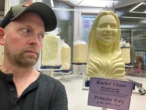 A life-sized bust made of butter of 19-year-old Rachel Visser, crowned Princess Kay of the Milky Way of the 2024 Minnesota State Fair. Life-like, but the dead eyes are a bit creepy. No, not me, the butter statue — which is on the right, by the way. (Ben Sigurdson / Free Press)