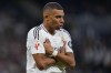 Real Madrid's Kylian Mbappe celebrates after scoring his side's second goal during a Spanish La Liga soccer match between Real Madrid and Alaves at Santiago Bernabeu stadium in Madrid, Spain, Tuesday, Sept. 24, 2024. (AP Photo/Manu Fernandez)